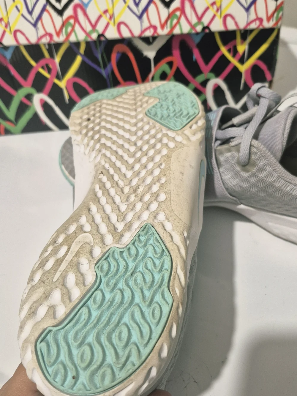 Nike Women’s Light Gray & Light Blue Slip-On Training Sneakers